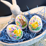 Hand painted blown eggs with spring scenes, decorative painting