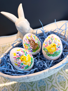 Hand painted blown eggs with spring scenes, decorative painting