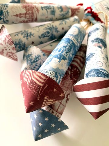 The Williamsburg Collection: Vintage Historic Paper Rockets with historical 1776 scenes including Betsy Ross, Liberty Bell, Founding Fathers, Old Glory
